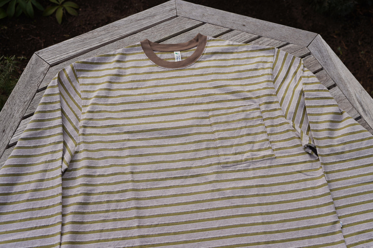 UNEVENNESS L/S TEE/GREEN – DEVELOPMENT BY NOROLL
